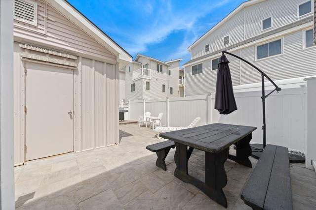 Shared back patio at Beau Rivage beach house, Sea Isle City